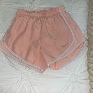 Peach Nike shorts
